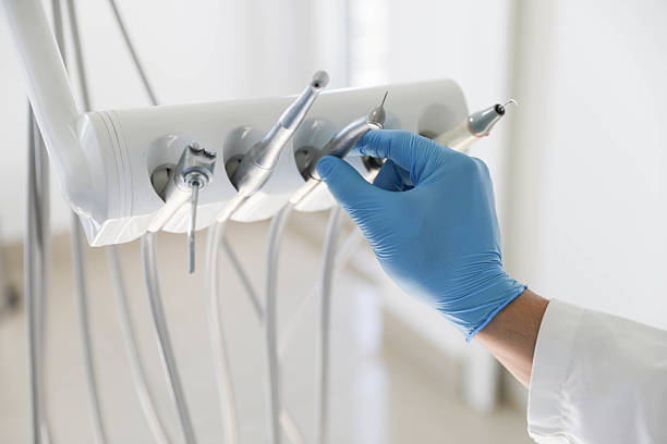 Professional Tooth Extraction technician working in Port Dickinson, NY
